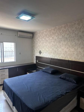 Suíte privada em apartamento compartilhado no centro de foz